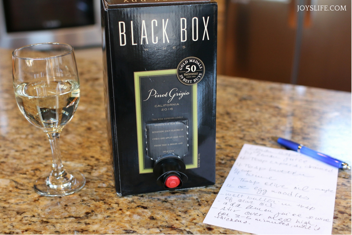 a glass of Black Box Pinot Grigio