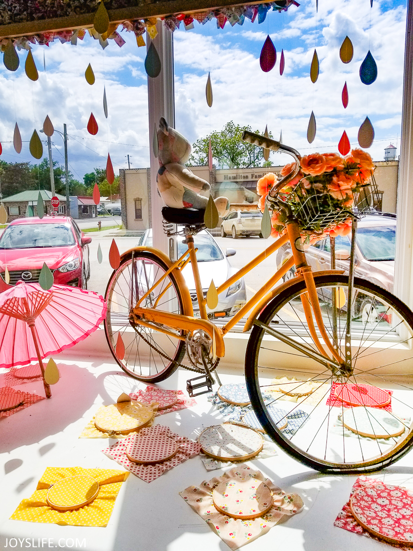 Amazing Rainy Weather Flower Basket Bike Pink Umbrella Window Display