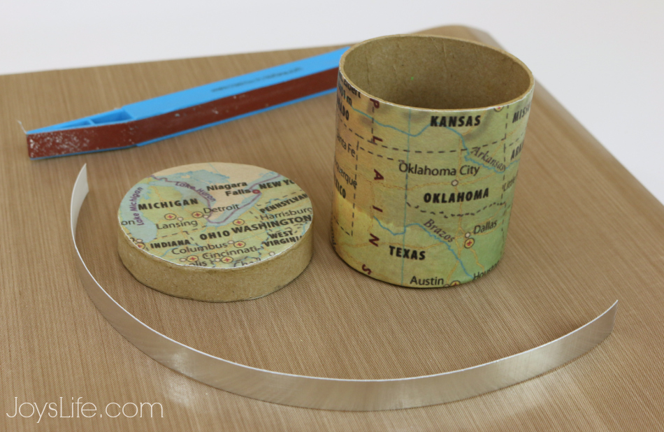 Embossing Foil Cardstock for a Decorative touch to this Mod Podge  Map Box