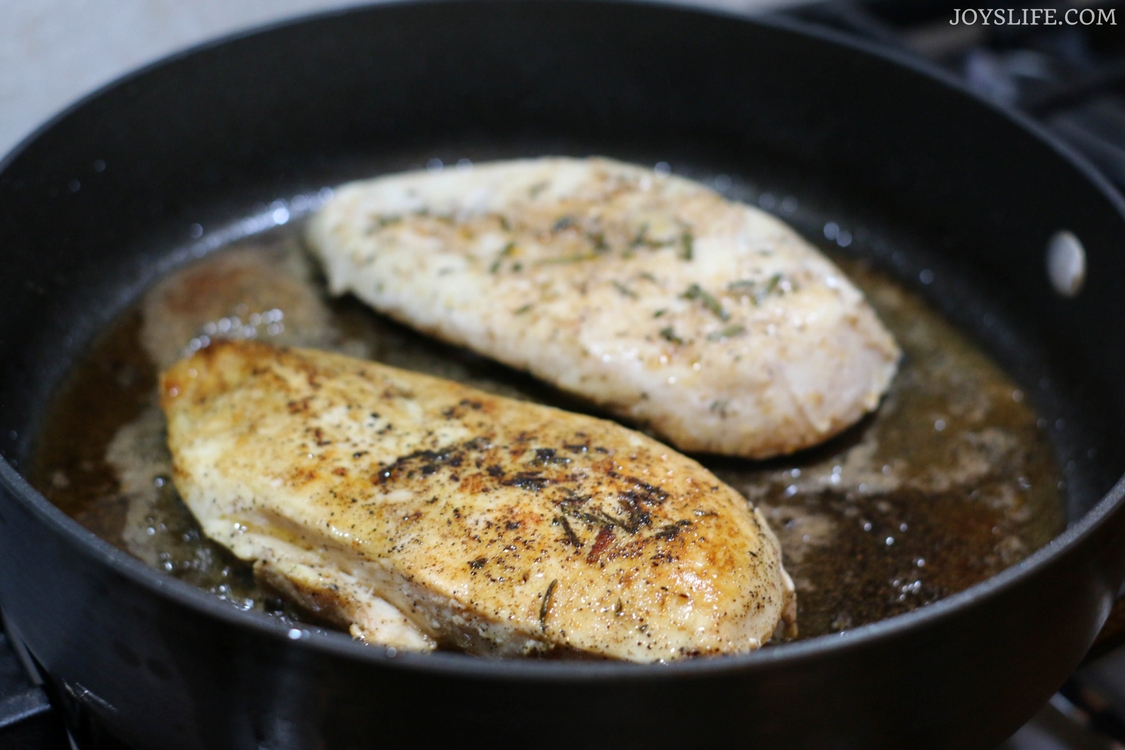 seared rosemary chicken in pan