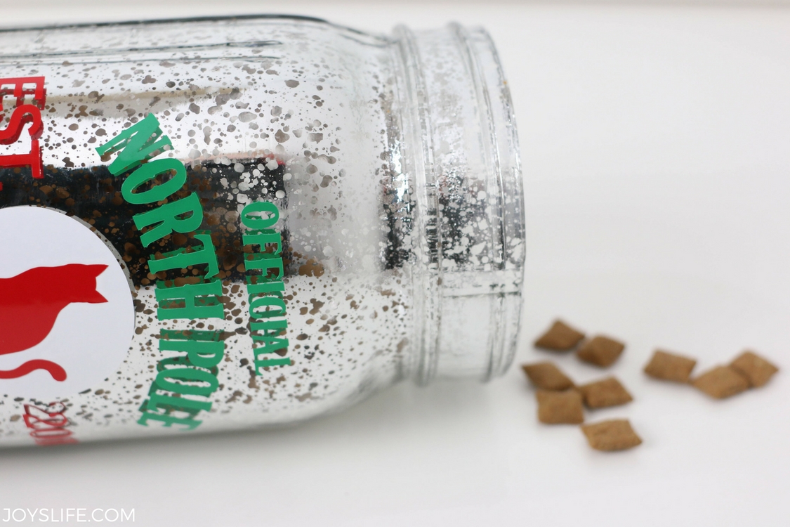 cat treats spilling jar side