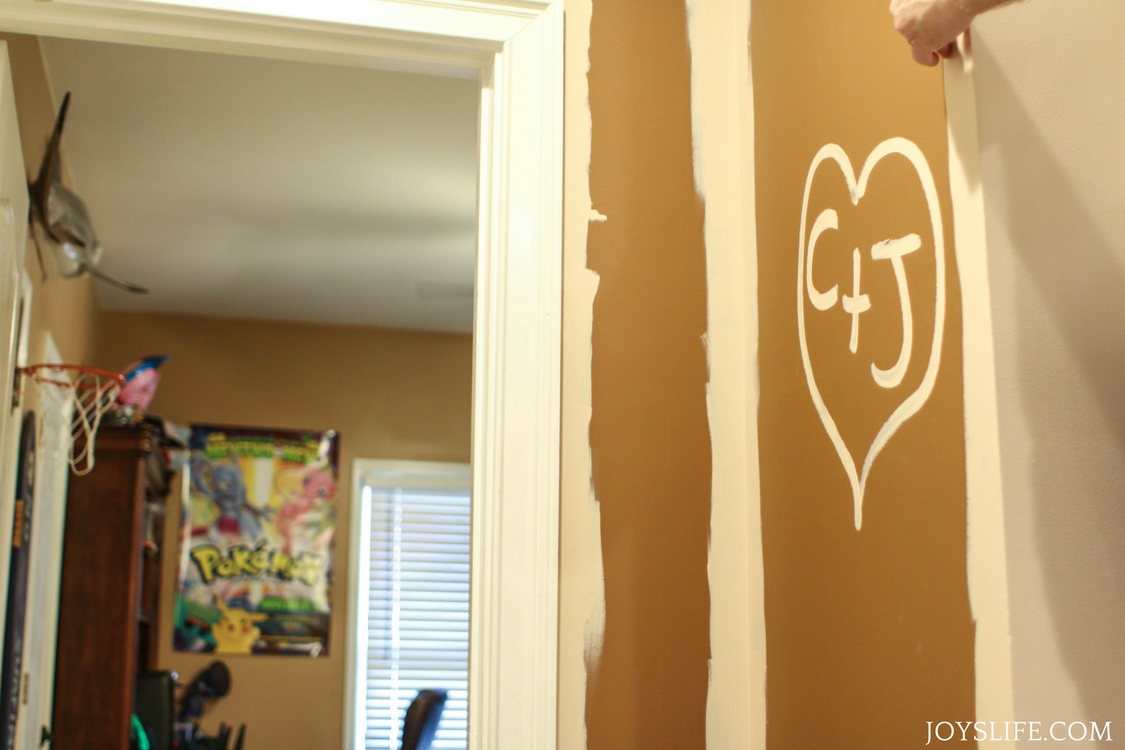 painted initials in hallway