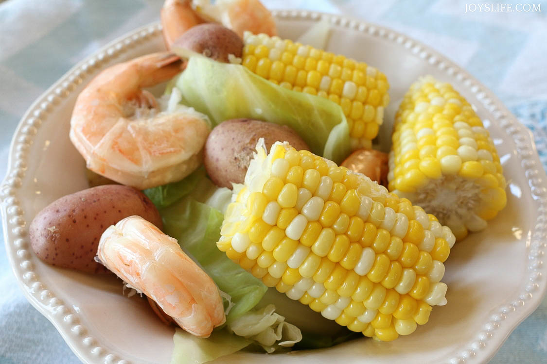 shrimp corn cabbage potato bowl ready to serve