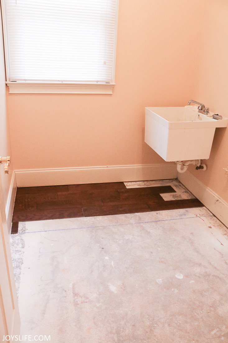 tiling a laundry room with ceramic wood tiling