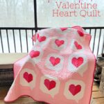 pink and red Valentine heart quilt draped over chair joyslife.com