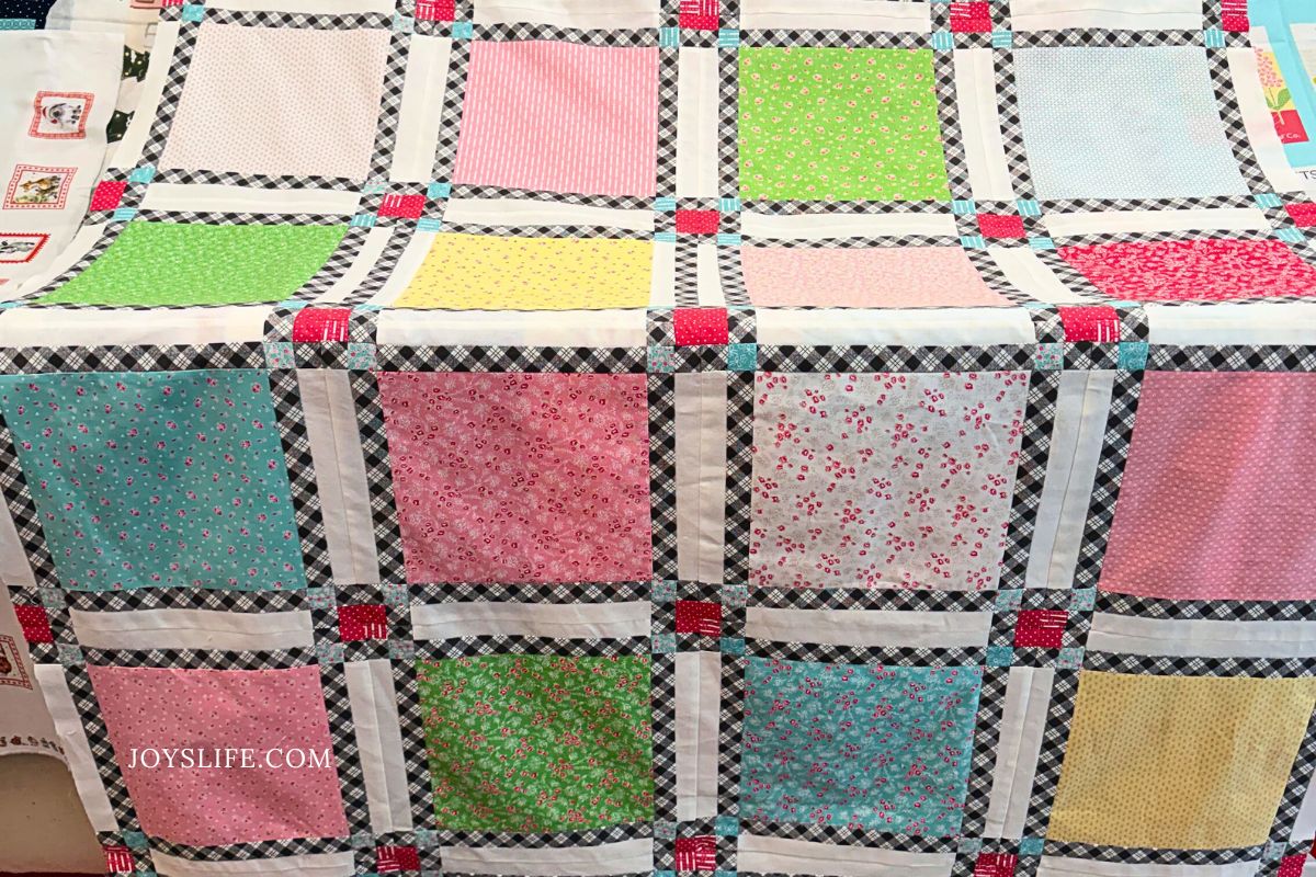 Pastel floral lattice quilt top with sashing and cornerstones, by Joy at JoysLife.com